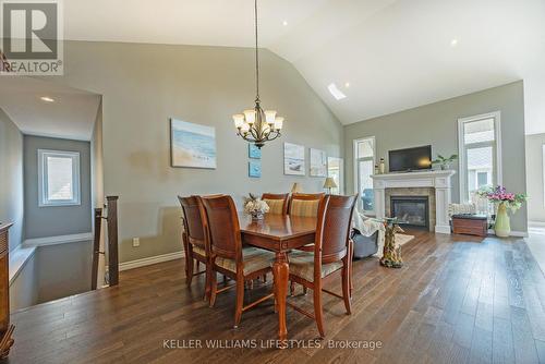 Dining room, view of living room - 190 Emery Street, Central Elgin (Port Stanley), ON - Indoor Photo Showing Dining Room With Fireplace