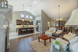 View of living room, dining room, and kitchen - 