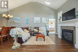 Living room, looking into primary bedroom - 