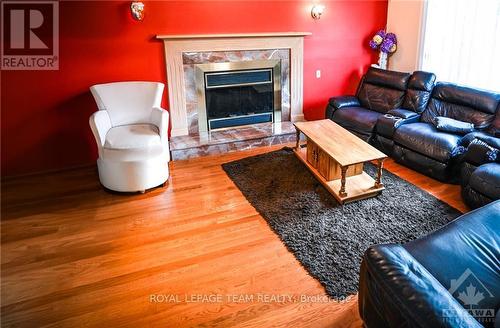 1327 Brookline Avenue, Ottawa, ON - Indoor Photo Showing Living Room With Fireplace