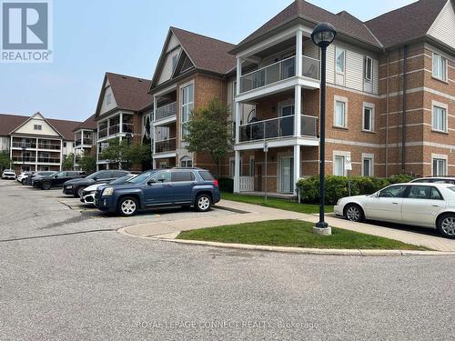 106 - 136 Aspen Springs Drive, Clarington (Bowmanville), ON - Outdoor With Facade