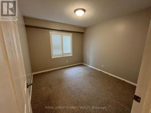 106 - 136 Aspen Springs Drive, Clarington (Bowmanville), ON - Indoor Photo Showing Other Room