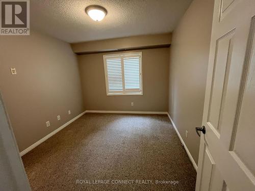 106 - 136 Aspen Springs Drive, Clarington (Bowmanville), ON - Indoor Photo Showing Other Room