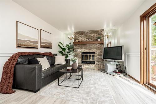 23 Princemere Road, Winnipeg, MB - Indoor Photo Showing Living Room With Fireplace