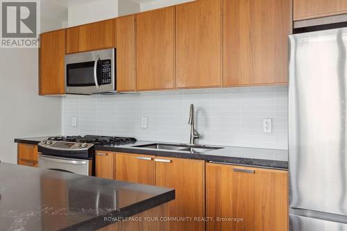 813 - 318 King Street E, Toronto (Moss Park), ON - Indoor Photo Showing Kitchen With Stainless Steel Kitchen With Double Sink With Upgraded Kitchen