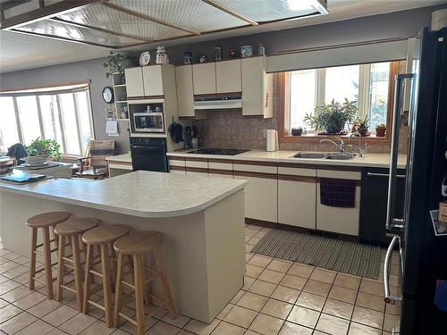 80045 36N Road, Glenboro, MB - Indoor Photo Showing Kitchen With Double Sink