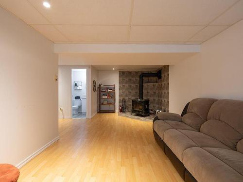 Playroom - 57 Rue Oakwood, Pincourt, QC - Indoor Photo Showing Living Room With Fireplace