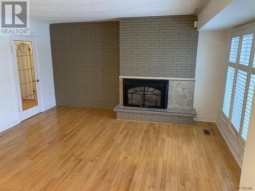 643 Pine St N, Timmins, ON - Indoor Photo Showing Other Room With Fireplace