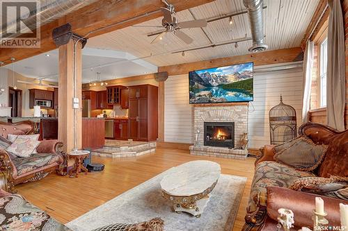 204 1170 Broad Street, Regina, SK - Indoor Photo Showing Living Room With Fireplace