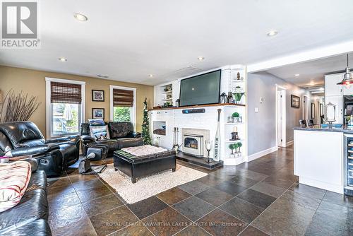 7 Gilson Street, Kawartha Lakes (Little Britain), ON - Indoor Photo Showing Living Room With Fireplace