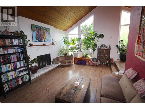 1726 Cedarwood Court, Dawson Creek, BC - Indoor Photo Showing Living Room With Fireplace