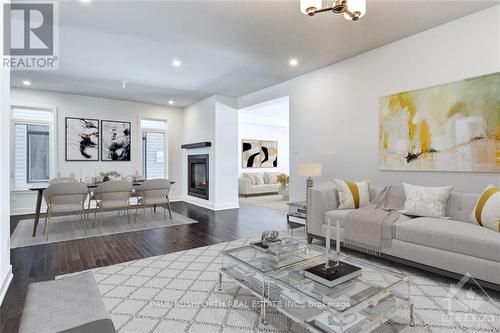 76 Big Dipper Street, Ottawa, ON - Indoor Photo Showing Living Room With Fireplace