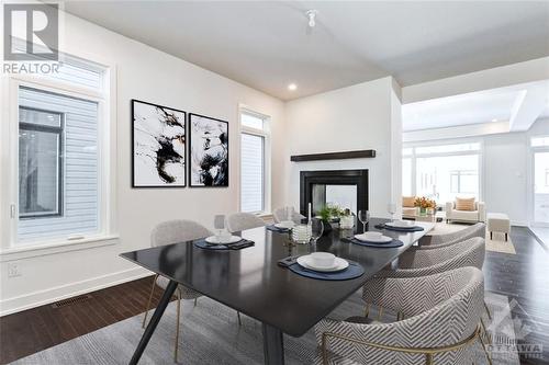 Virtually Staged - 76 Big Dipper Street, Ottawa, ON - Indoor Photo Showing Dining Room With Fireplace