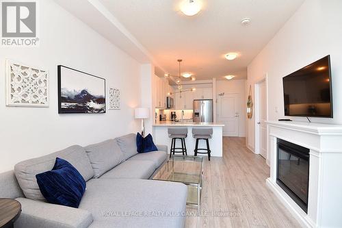 633 - 101 Shoreview Place, Hamilton (Stoney Creek), ON - Indoor Photo Showing Living Room With Fireplace