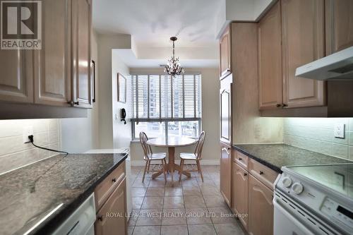 509 - 2 Aberfoyle Crescent, Toronto (Islington-City Centre West), ON - Indoor Photo Showing Kitchen With Upgraded Kitchen