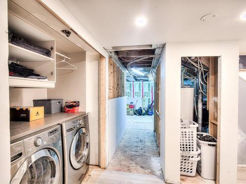 Salle de lavage - 50 Boul. Ste-Rose, Laval (Sainte-Rose), QC - Indoor Photo Showing Laundry Room