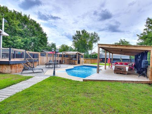 Vue d'ensemble - 50 Boul. Ste-Rose, Laval (Sainte-Rose), QC - Outdoor With In Ground Pool With Deck Patio Veranda