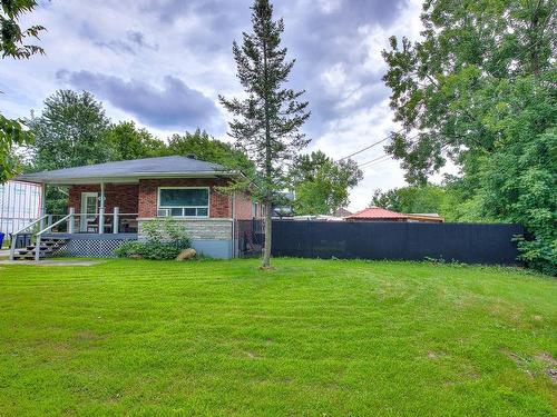 Overall view - 50 Boul. Ste-Rose, Laval (Sainte-Rose), QC - Outdoor With In Ground Pool With Deck Patio Veranda With Backyard