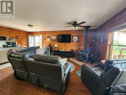 118 Elk Road, Crooked Lake, SK - Indoor Photo Showing Living Room With Fireplace