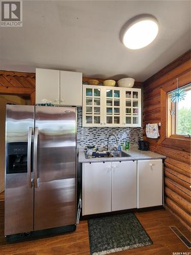 118 Elk Road, Crooked Lake, SK - Indoor Photo Showing Kitchen With Double Sink