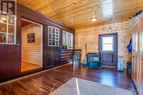 1519 6 Highway, Cherryville, BC - Indoor Photo Showing Other Room With Fireplace