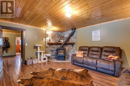 1519 6 Highway, Cherryville, BC - Indoor Photo Showing Living Room With Fireplace