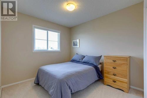 42 Eversyde Common Sw, Calgary, AB - Indoor Photo Showing Bedroom