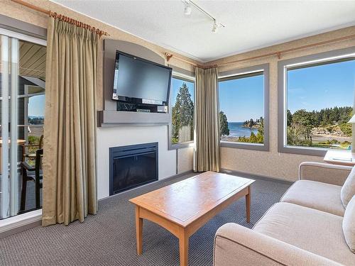 727-1600 Stroulger Rd, Nanoose Bay, BC - Indoor Photo Showing Living Room With Fireplace