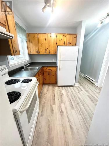 254-256 Britain Street, Saint John, NB - Indoor Photo Showing Kitchen With Double Sink