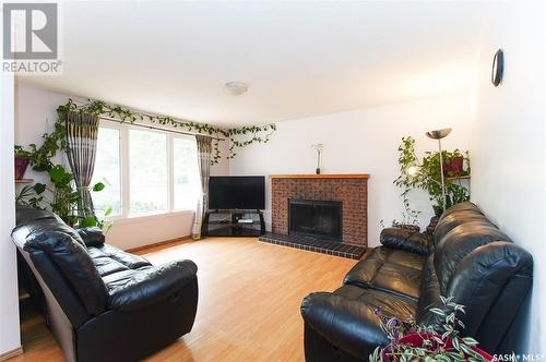 123 Mackenzie Crescent, Regina, SK - Indoor Photo Showing Living Room With Fireplace