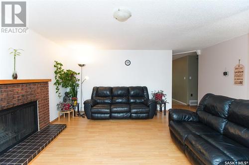 123 Mackenzie Crescent, Regina, SK - Indoor Photo Showing Living Room With Fireplace