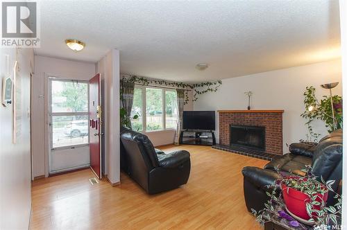 123 Mackenzie Crescent, Regina, SK - Indoor Photo Showing Living Room With Fireplace