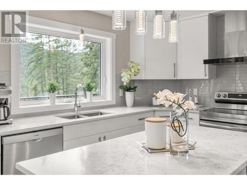 7967 Falcon Ridge Crescent, Kelowna, BC - Indoor Photo Showing Kitchen With Stainless Steel Kitchen With Double Sink With Upgraded Kitchen