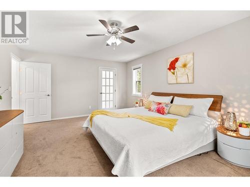 7967 Falcon Ridge Crescent, Kelowna, BC - Indoor Photo Showing Bedroom