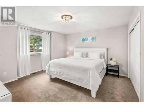 7967 Falcon Ridge Crescent, Kelowna, BC - Indoor Photo Showing Bedroom