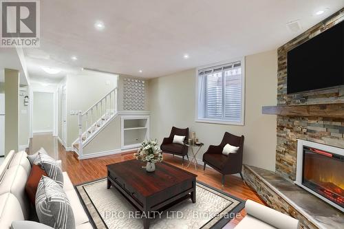 Lower - 588 Peach Blossom Court, Kitchener, ON - Indoor Photo Showing Living Room With Fireplace