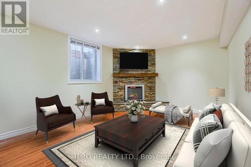 Lower - 588 Peach Blossom Court, Kitchener, ON - Indoor Photo Showing Living Room With Fireplace