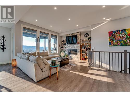 6722 Blackcomb Way, Vernon, BC - Indoor Photo Showing Living Room With Fireplace