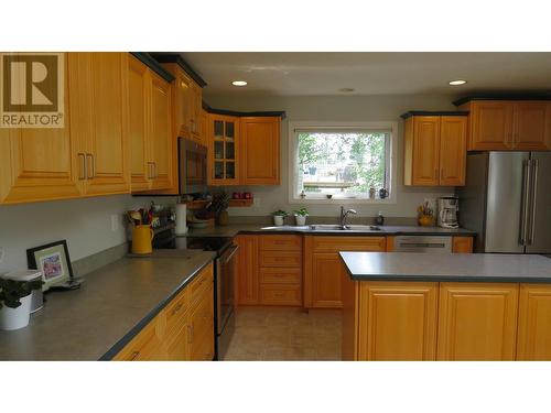 229 S Grosz Road, Quesnel, BC - Indoor Photo Showing Kitchen With Double Sink