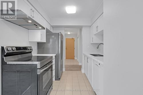 208 - 330 Rathburn Road W, Mississauga (City Centre), ON - Indoor Photo Showing Kitchen With Stainless Steel Kitchen