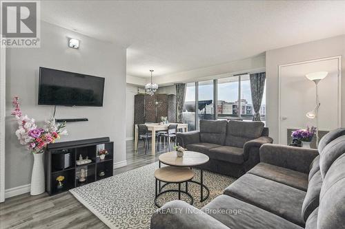 1205 - 10 Stonehill Court, Toronto, ON - Indoor Photo Showing Living Room