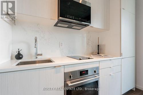 410 - 21 Lawren Harris Square, Toronto (Waterfront Communities), ON - Indoor Photo Showing Kitchen