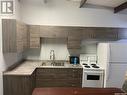 597 Broadway Street W, Fort Qu'Appelle, SK  - Indoor Photo Showing Kitchen With Double Sink 