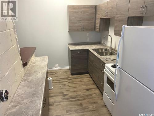 597 Broadway Street W, Fort Qu'Appelle, SK - Indoor Photo Showing Kitchen With Double Sink