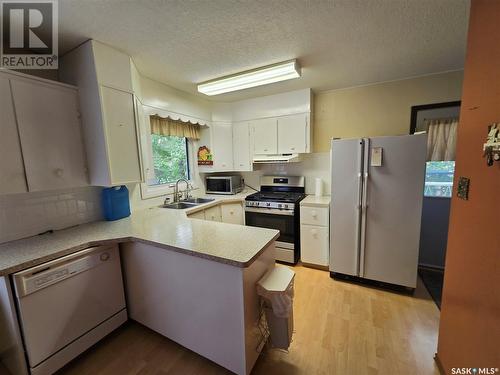 203 Calder Street, Kennedy, SK - Indoor Photo Showing Kitchen With Double Sink