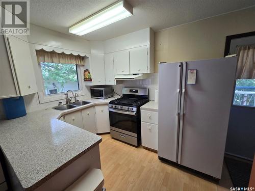 203 Calder Street, Kennedy, SK - Indoor Photo Showing Kitchen With Double Sink