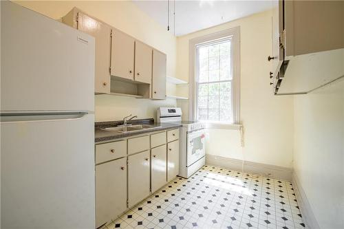 321 Main Street W, Hamilton, ON - Indoor Photo Showing Kitchen With Double Sink