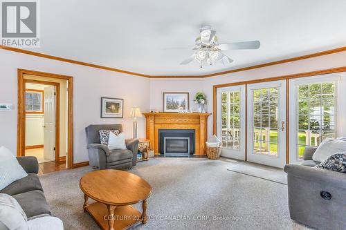 73157 Harris Avenue, Bluewater (St. Joseph), ON - Indoor Photo Showing Living Room With Fireplace