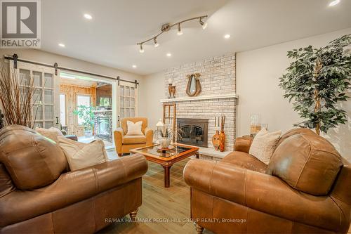 34 Marilyn Street, Caledon (Caledon East), ON - Indoor Photo Showing Living Room With Fireplace