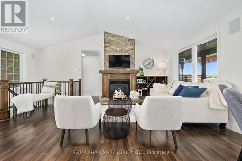 9 Fieldcrest Court, Brighton, ON - Indoor Photo Showing Living Room With Fireplace